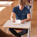 t-shirt-mockup-of-a-young-man-taking-an-exam-39088-r-el2