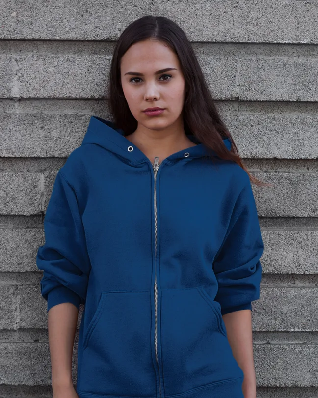clothing-mockup-of-a-woman-in-a-hoodie-against-a-wall-a7880